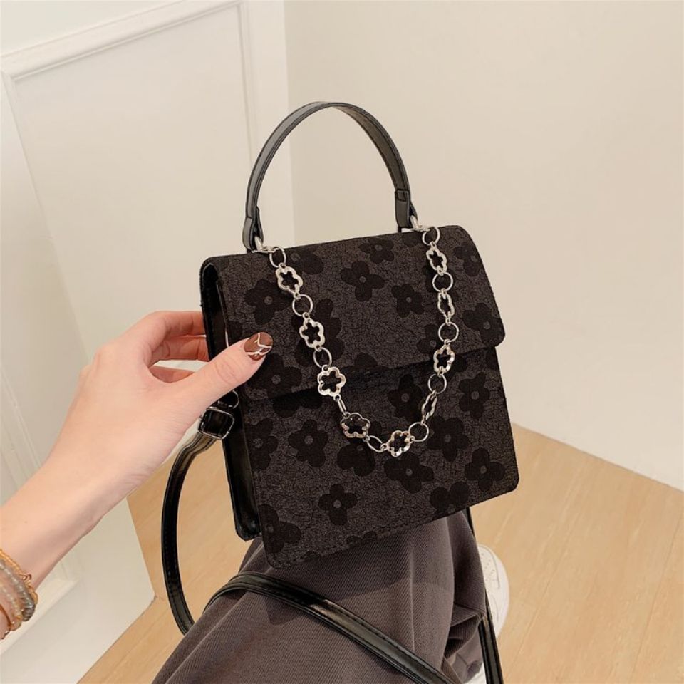 Adorable bolso de mano / bolso cruzado de cuero negro floral retro 