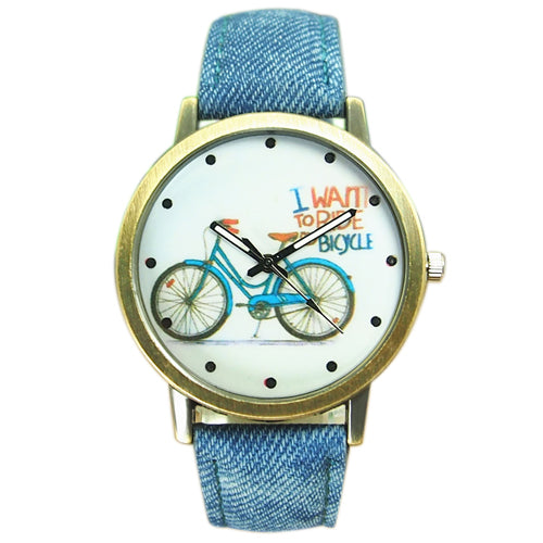 Reloj de pulsera analógico de cuarzo con correa de tela Jean de bronce para bicicleta a la moda para mujer