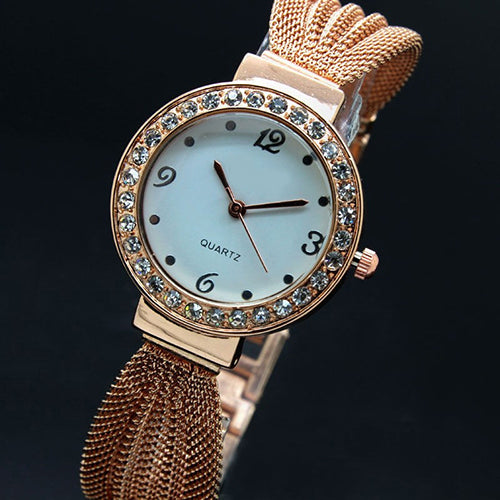 Reloj de pulsera analógico de cuarzo con banda de malla de diamantes de imitación con incrustaciones para mujer