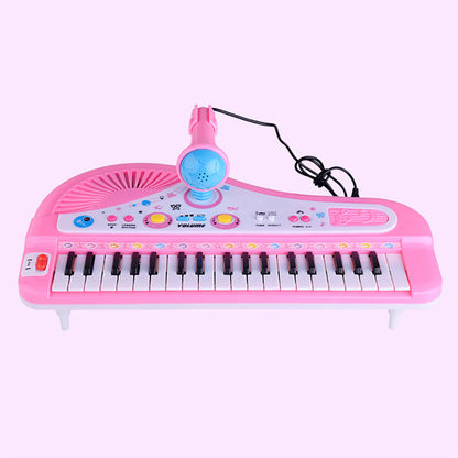 Piano electrónico de 37 teclas con micrófono para niños tocando instrumento musical de juguete