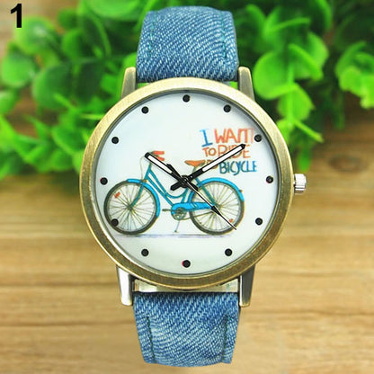 Reloj de pulsera analógico de cuarzo con correa de tela Jean de bronce para bicicleta a la moda para mujer