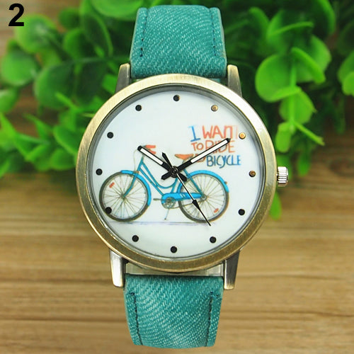 Reloj de pulsera analógico de cuarzo con correa de tela Jean de bronce para bicicleta a la moda para mujer